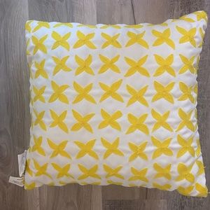 yellow and white sham pillow